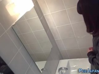 Asian babes filmed peeing